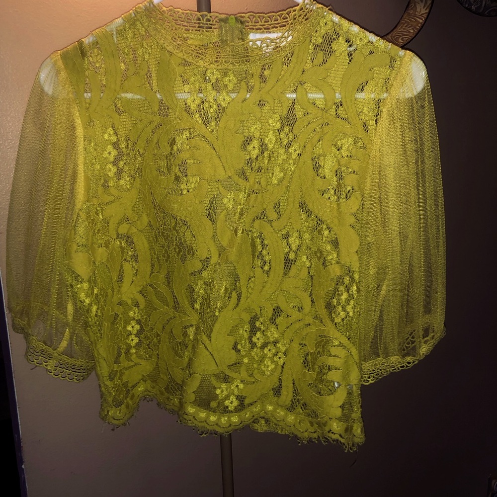 Too cute love this shirt! Lace see through! Mustard color! Zips in the back
